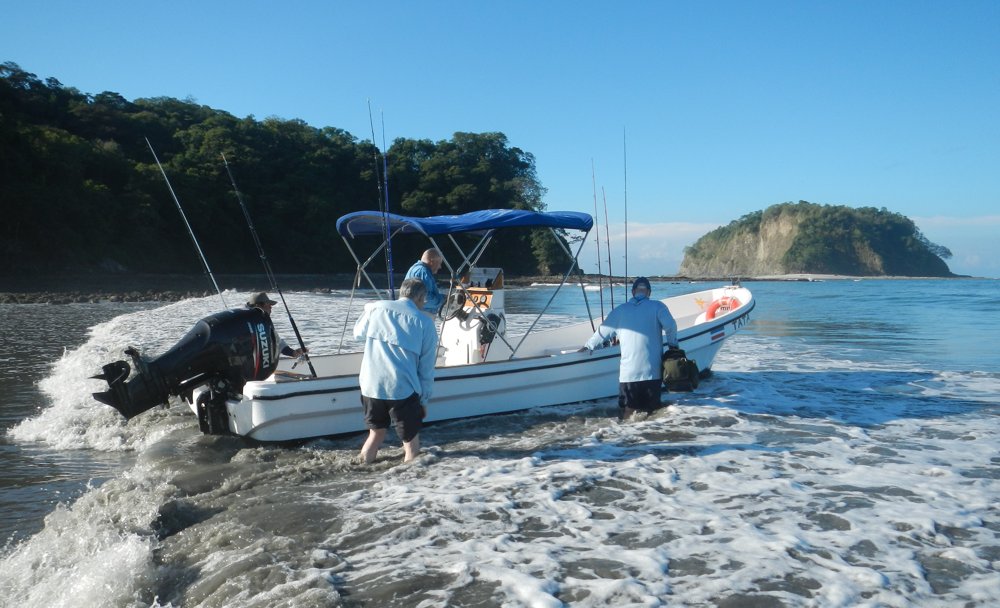 launching boat in surf costa rica
