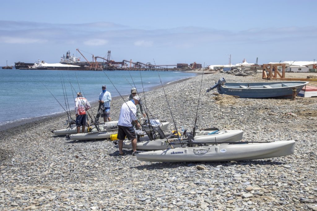 Kayak fishing Cedros Island, Baja -- anglers prepare to launch their kayaks from the beach