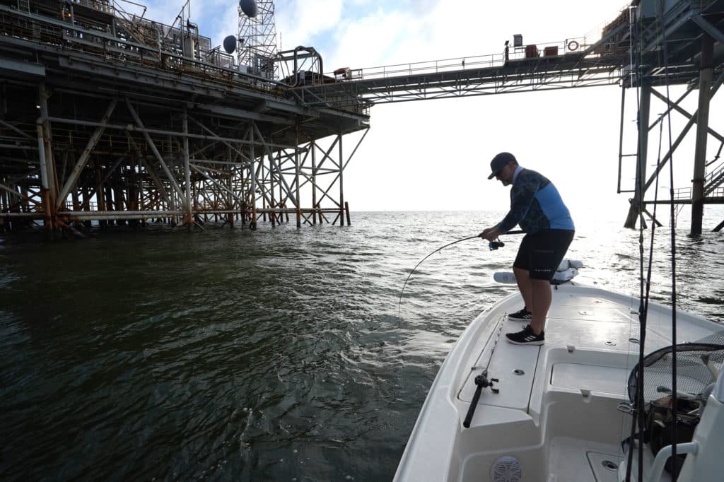 Casting a Diezel Minnow toward rig structure in about 50 feet