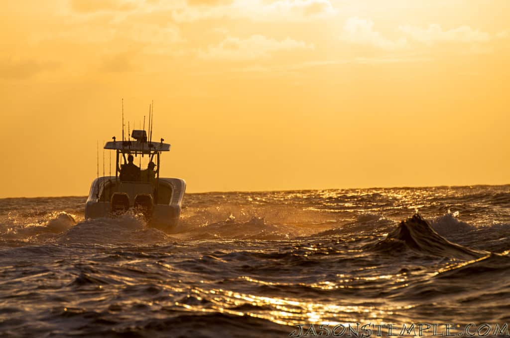 fishing boats in sunset