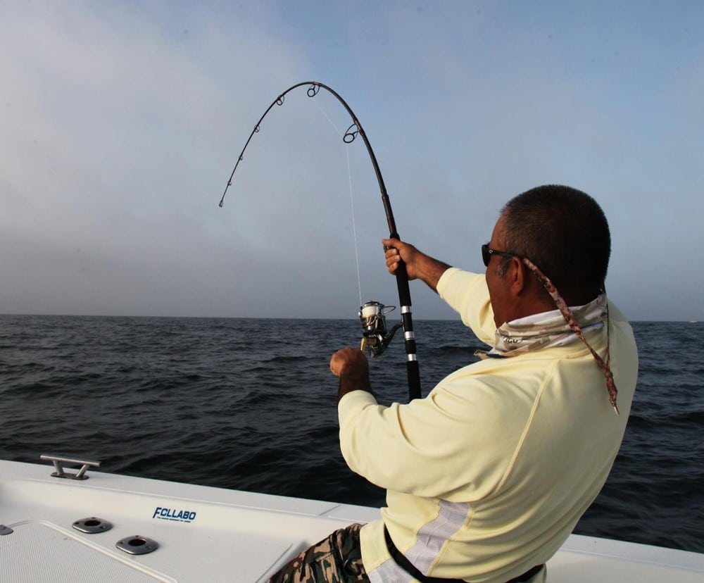 Angler strains against a huge giant trevally off southern Oman