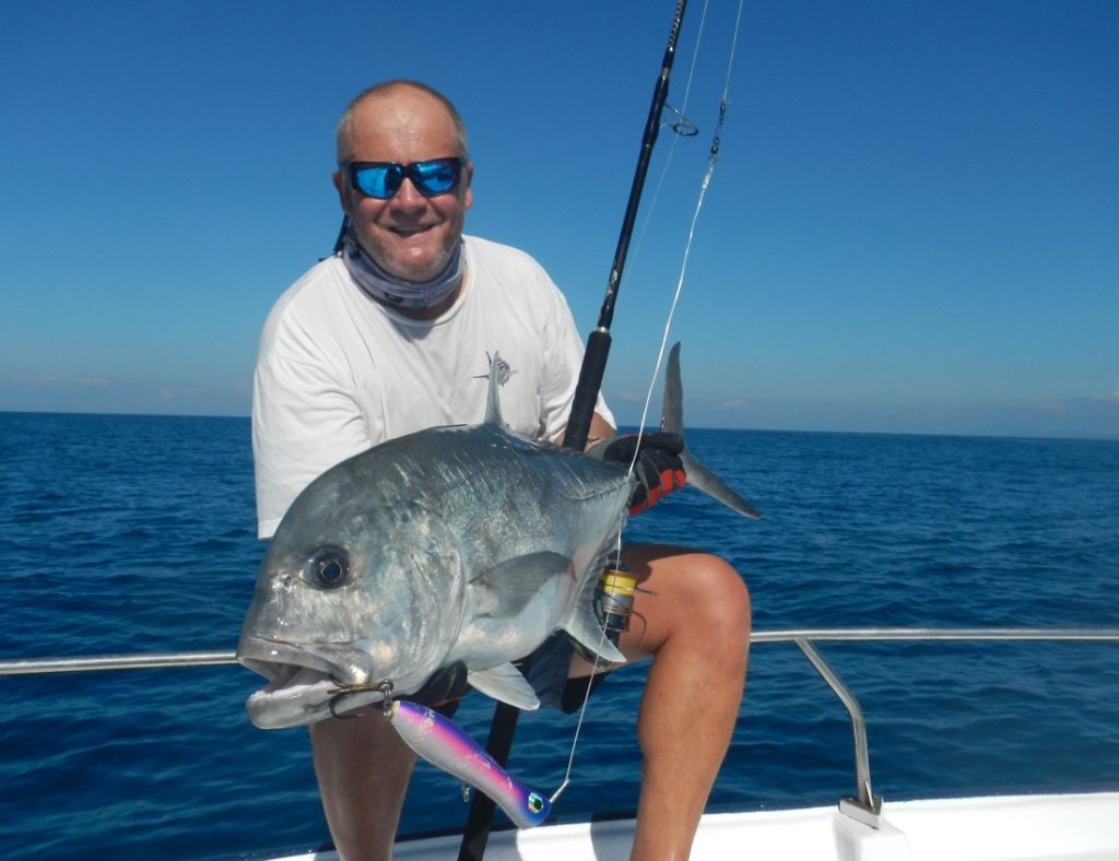 Angler Dave Lewis holding a fish caught in Madagascar
