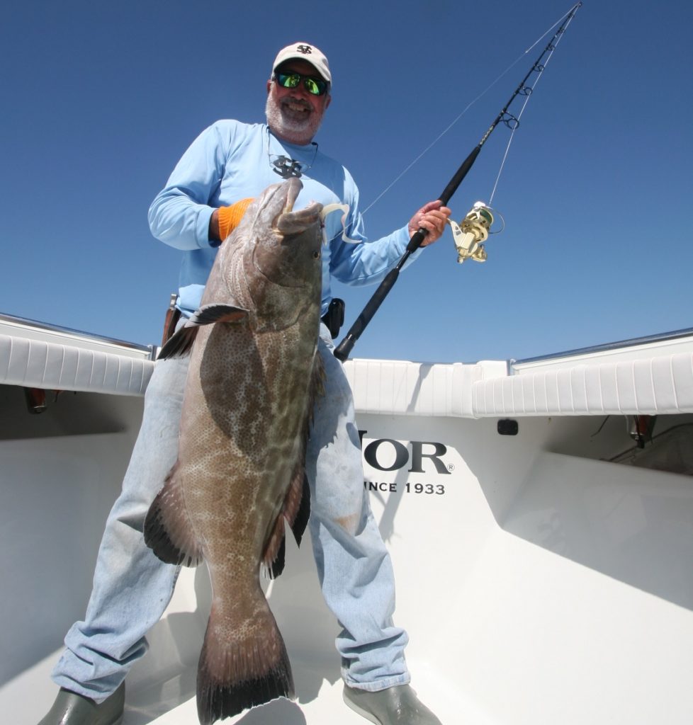 Capt. R.T. Trosset holding a grouper