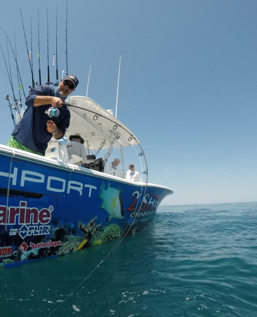 Angler puts pressure on a bottom fish in about 60 feet of water, fishing the Gulf off Crystal River.