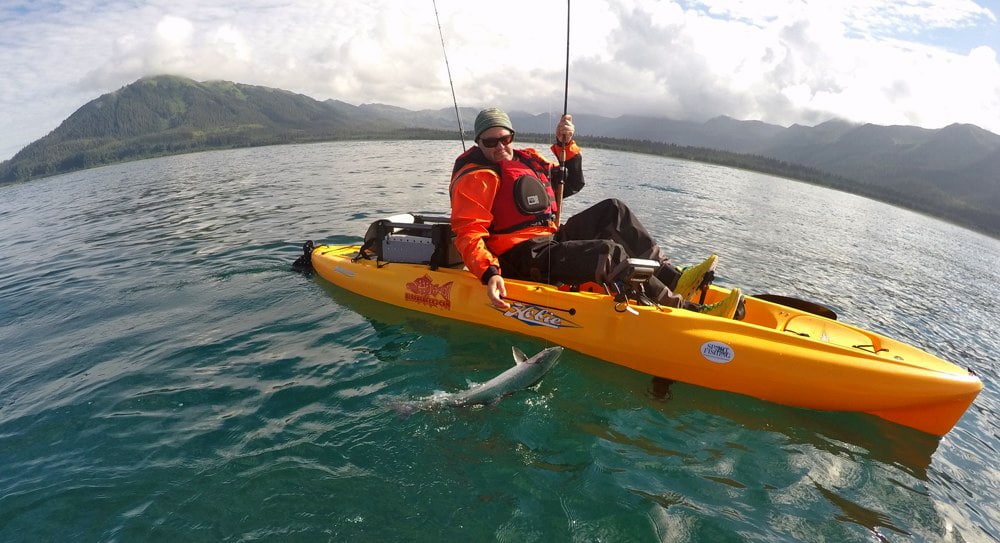 Kayak anglers lands a salmon