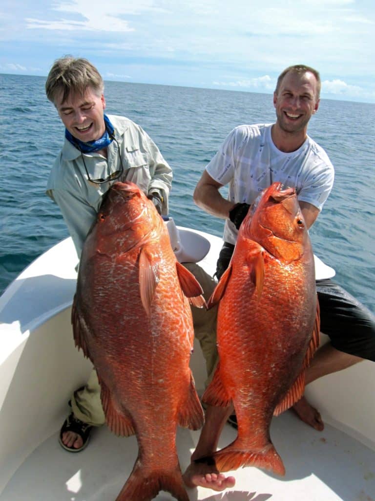 Anglers grin and grab cubera snapper Panama