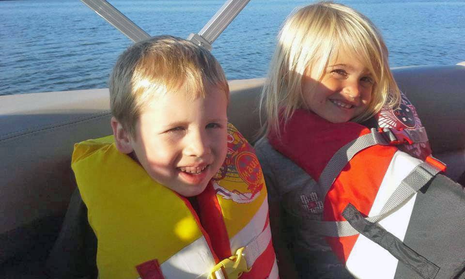 Siblings wearing life jackets Lake Wilheim, Pennsylvania