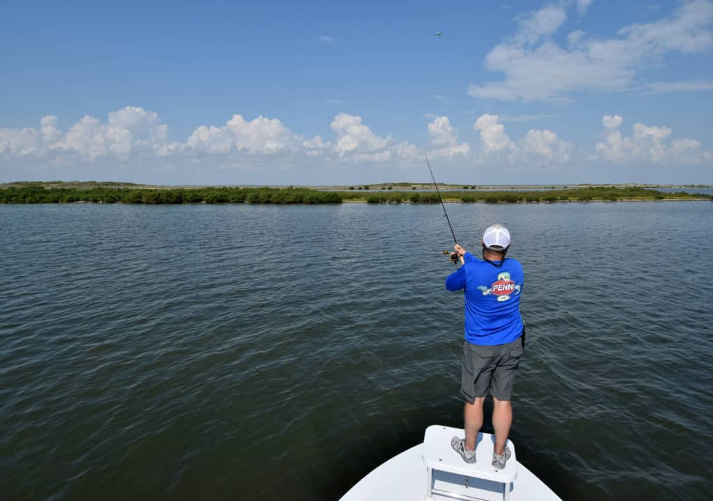 Angler casting inshore