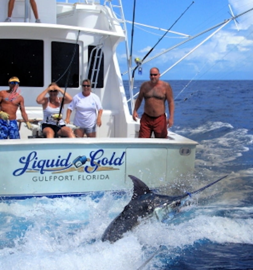 Fishermen backing down sport fishing boat