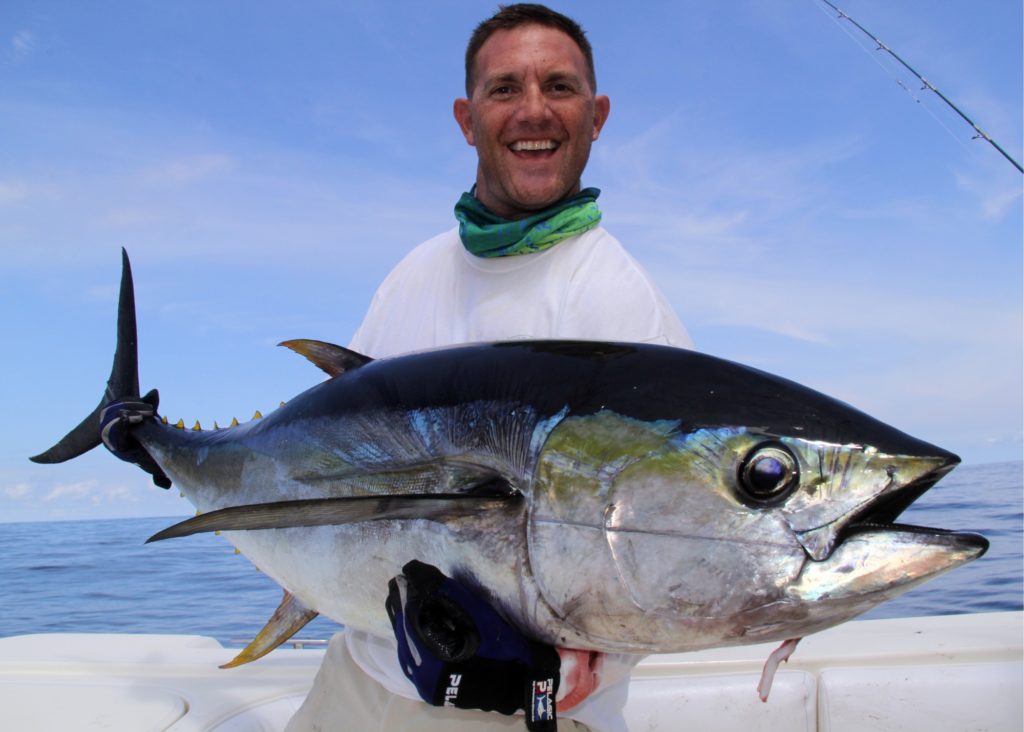 Panama fishing captain holding Chiriqui tuna