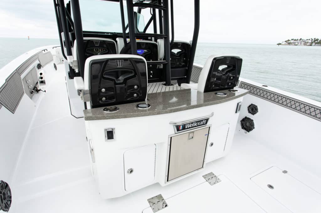 Tackle storage behind helm seats