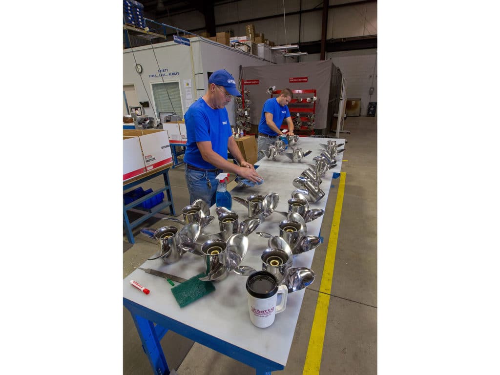 Yamaha outboard boat propeller being polished