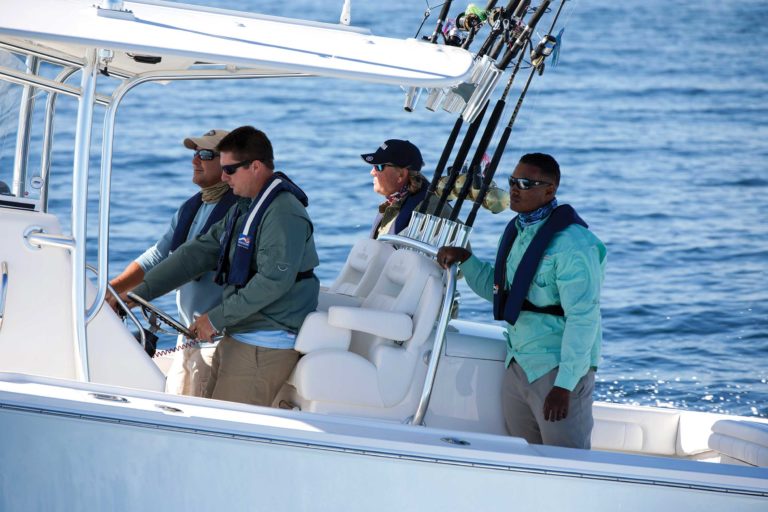 Center-console fishing boat heading out