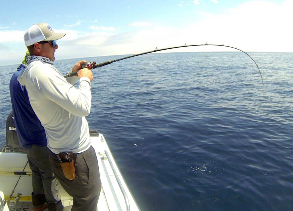Catching fish using a low-profile reel