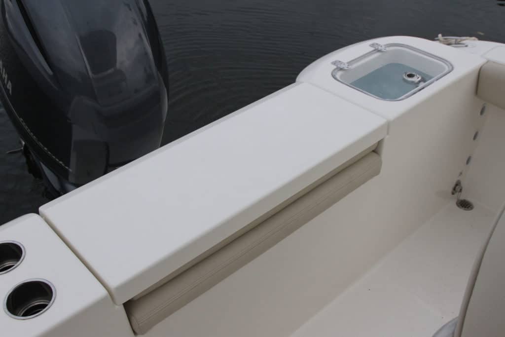 Cobia 220 CC transom with seat and livewell
