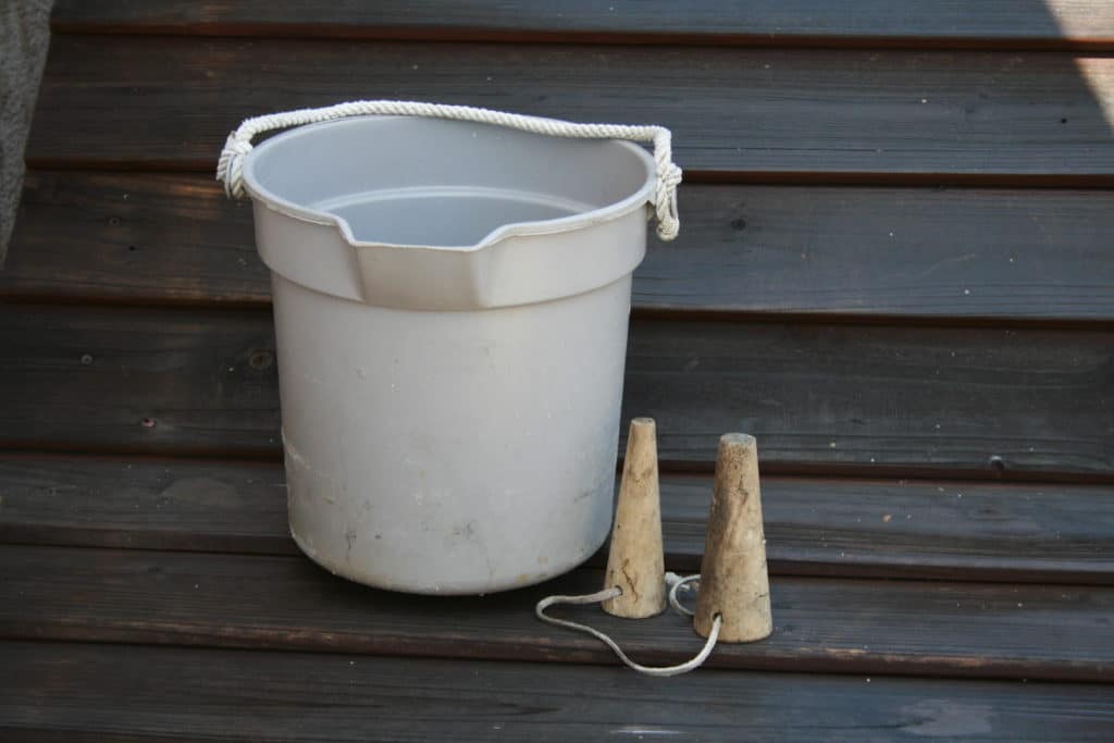 Fishing boat bilge check supplies bucket soft-wood bungs