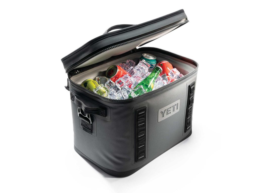 Soft-sided cooler holding drinks