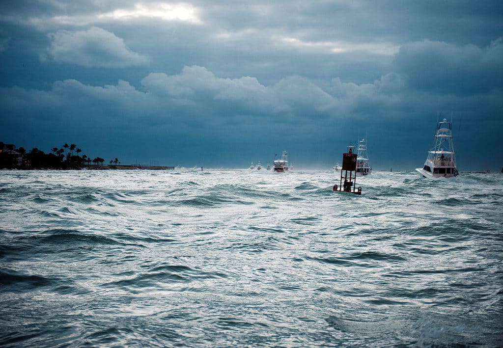 Tournament Fishing Boats Head Offshore into Bad Weather
