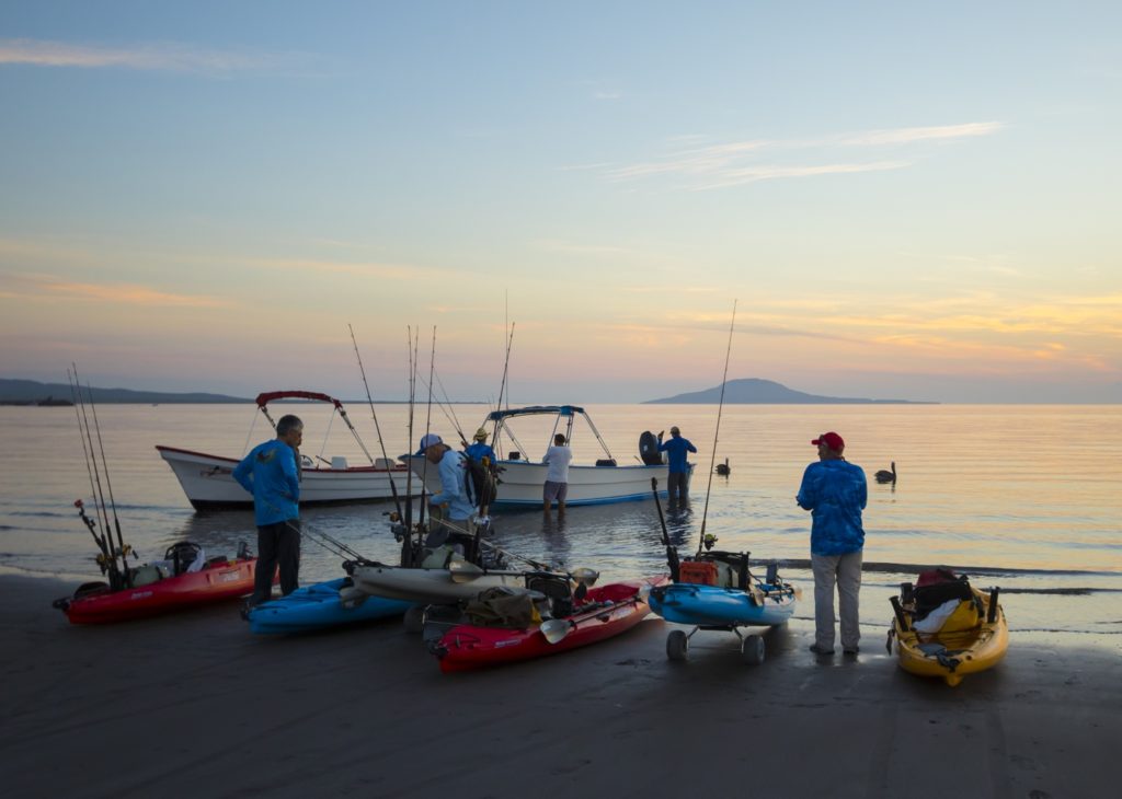 waiting Hobie kayaks to board pangas for kayak fishing Baja’s Central Sea of Cortez