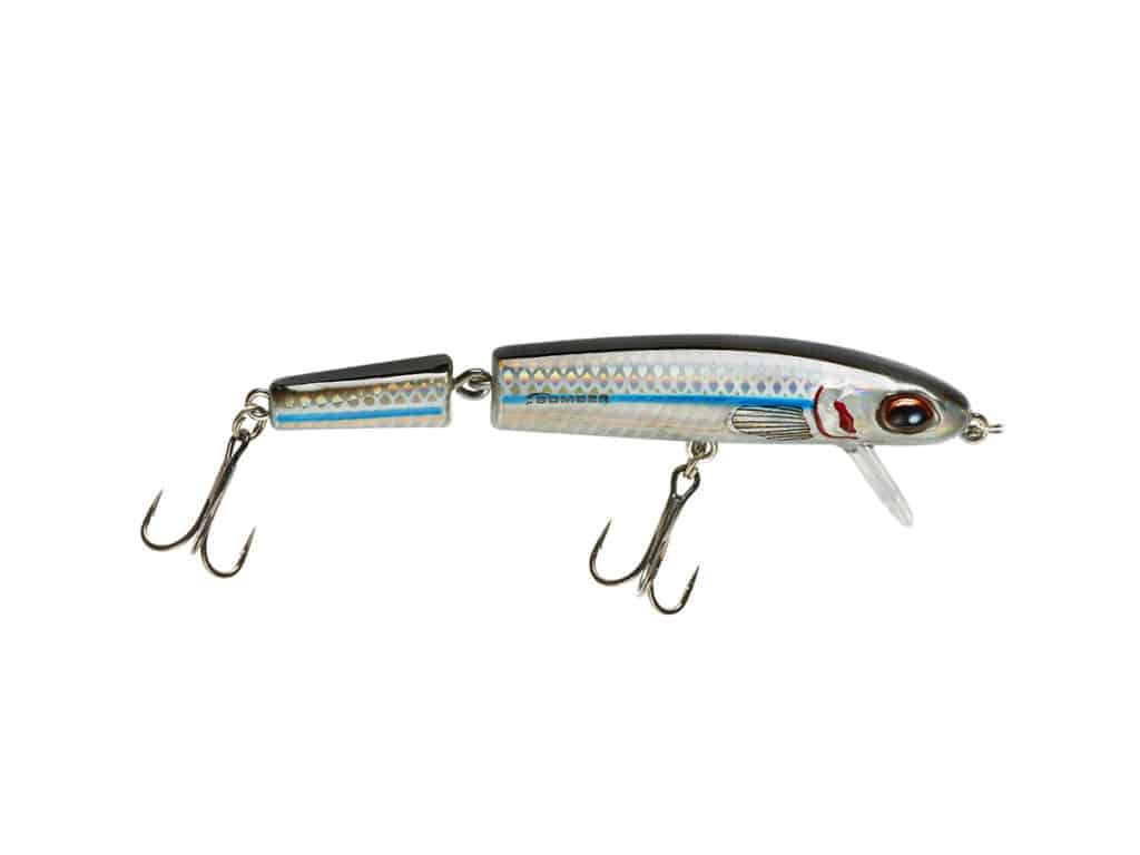 design a high-performance top water popper lure specifically for saltwater  surf fishing. the lure should be optimized to attract and entice aggressive  saltwater game fish. provide a detailed description of the lure's