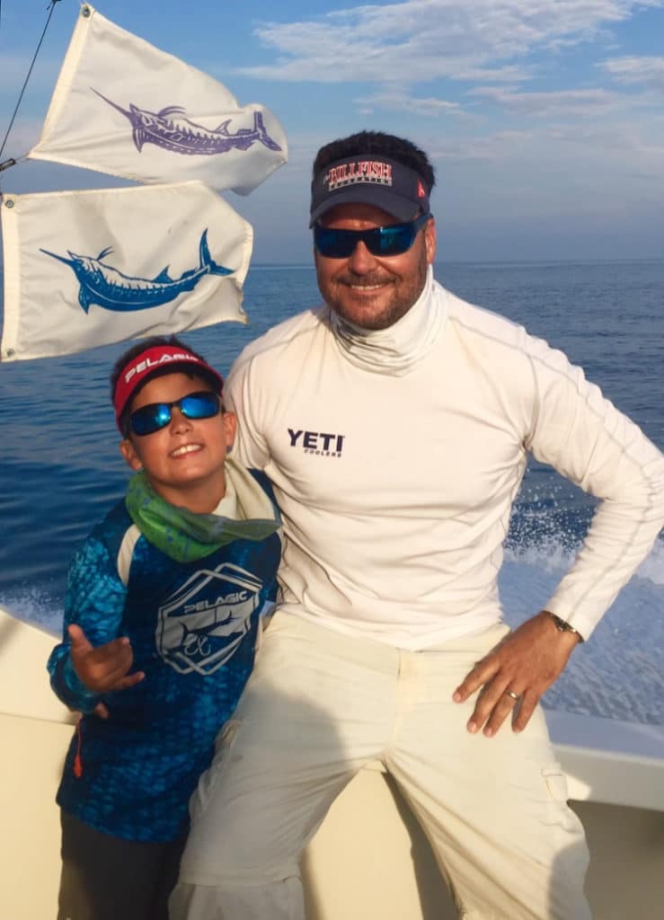 Capt Brad Philipps - record for billfish releases, with son darrel
