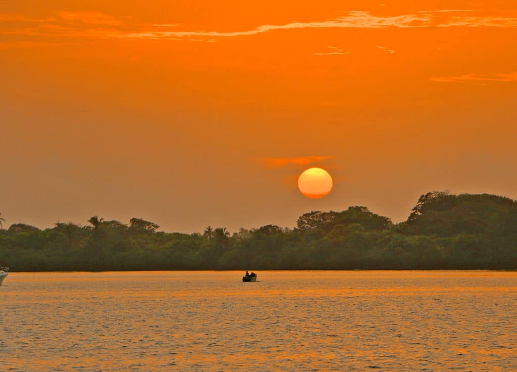 Panama San Blas Islands sunset fishing boat