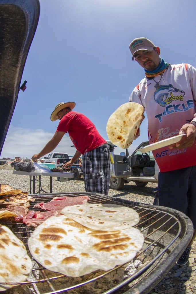 Guides cook up a shore lunch on Mexico's Cedros Island