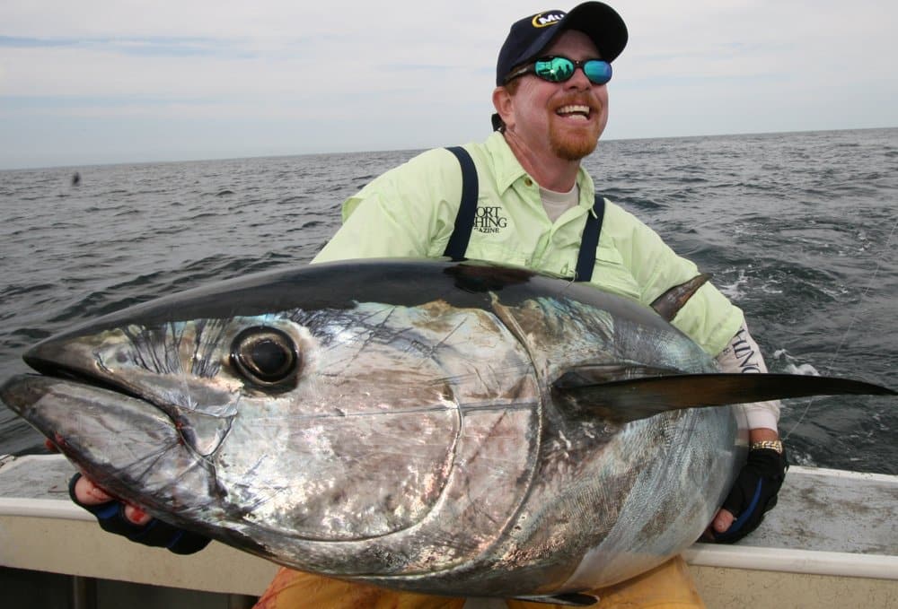 Anglers holds man-sized bluefin tuna