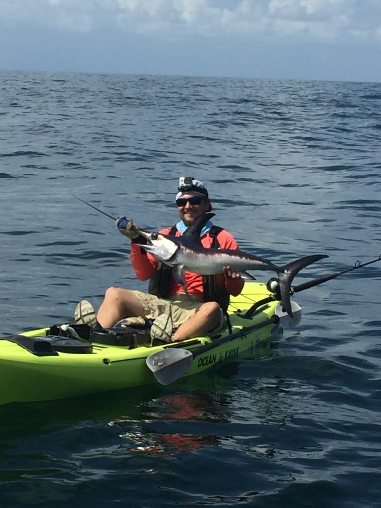 Chris Vecsey lands swordfish from kayak 70 miles out