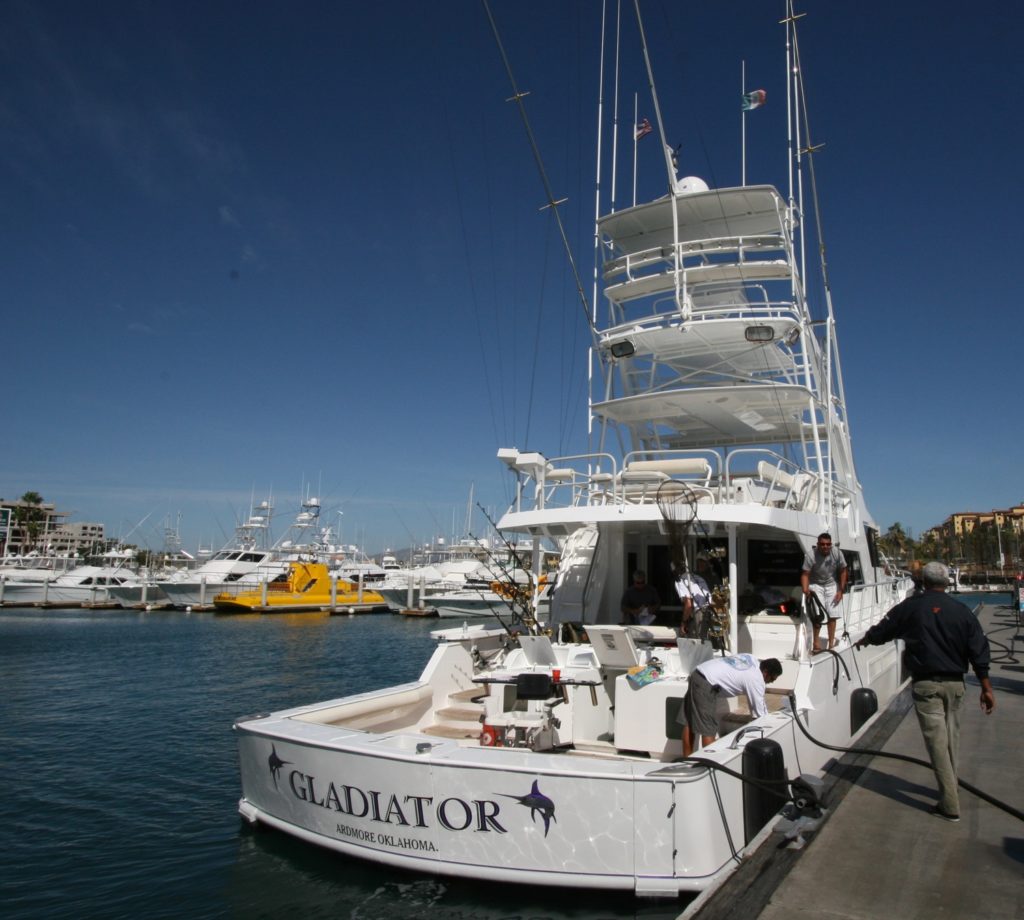 Large sport-fishing yacht at dock in Cabo
