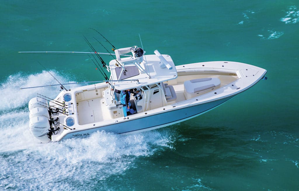 Mako boats 334 CC triple outboards running offshore fishing