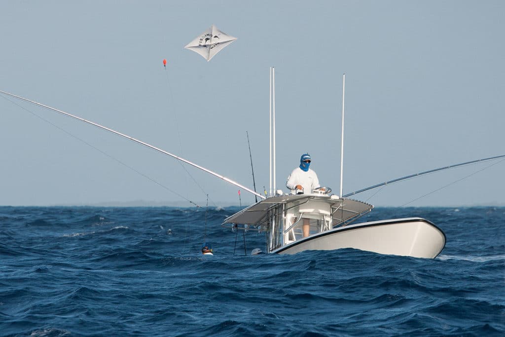 Anglers in a fishing boat while kitefishing for sailfish
