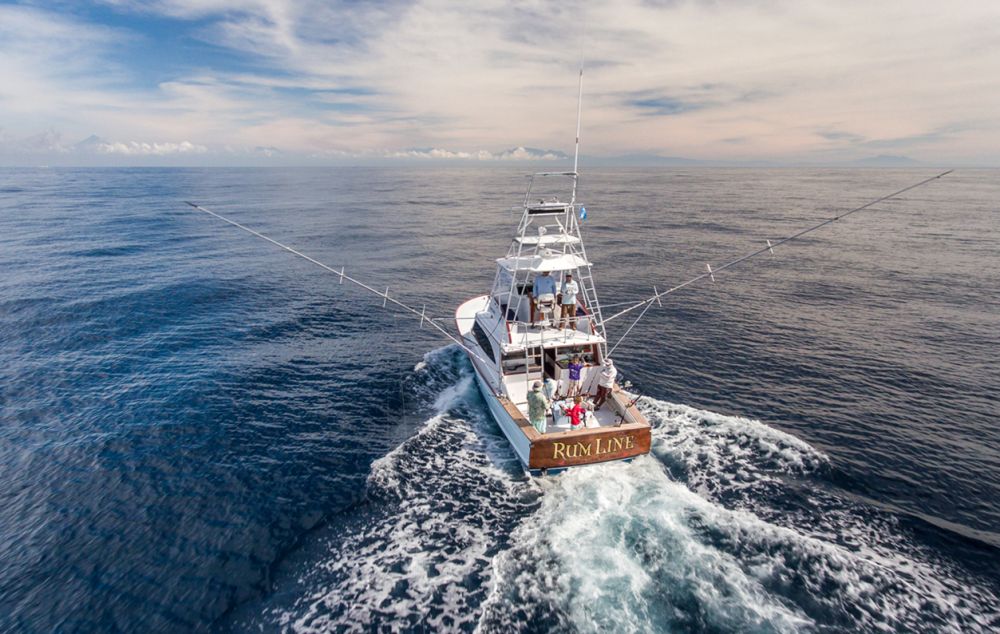 Trolling for sailfish on a flat Pacific off Guatemala