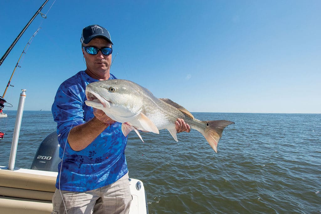 Capt. James Lavanway and Redfish off the Scout 215 XSF