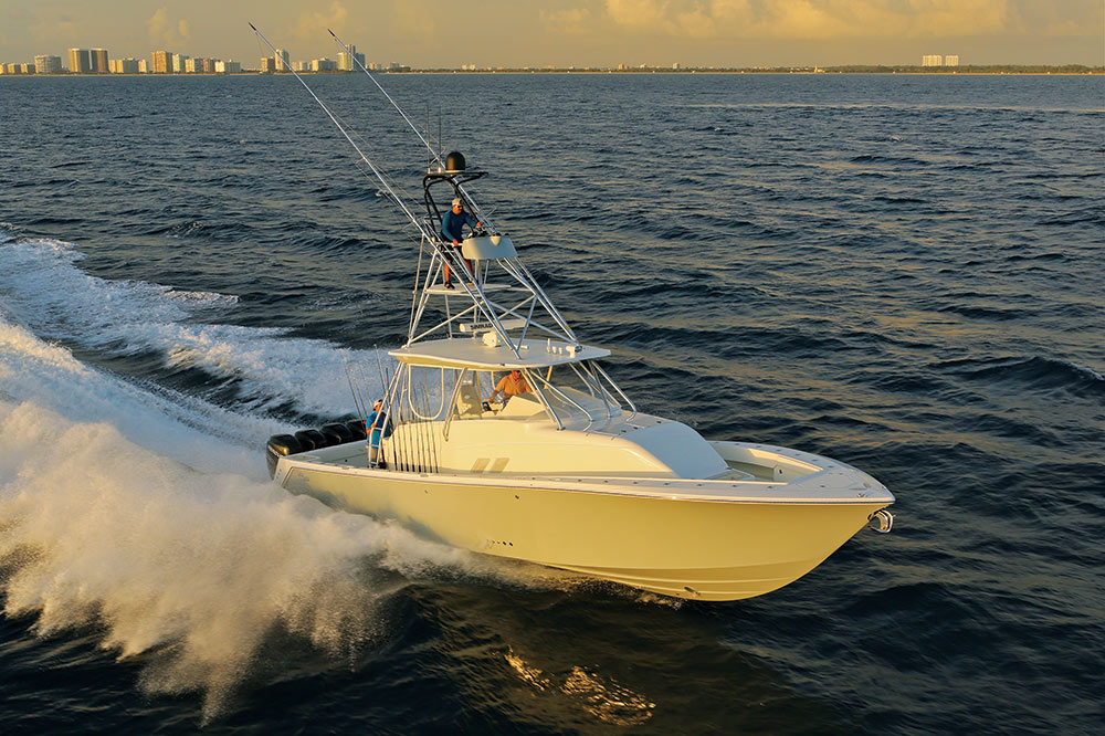 SeaVee 430FA center-console saltwater fishing boat running triple 300 Mercury Verado outboards