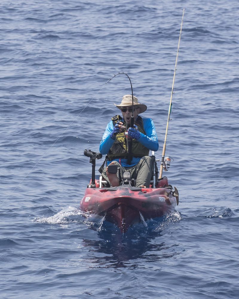A Pacific sailfish takes a kayak angler for a ride off Guatemala