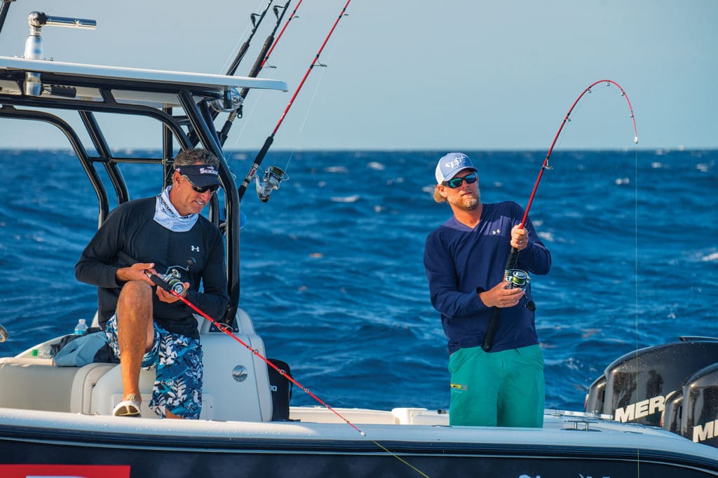 Fisherman slow jigging for bottomfish