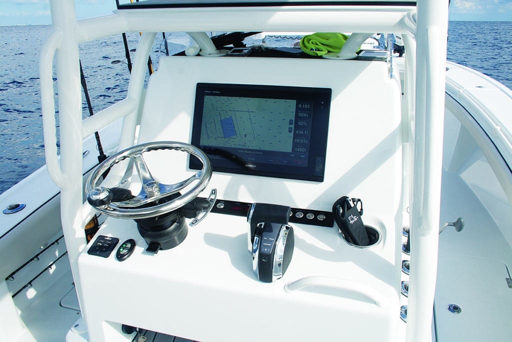 The Barker 26 Open features a glass helm.