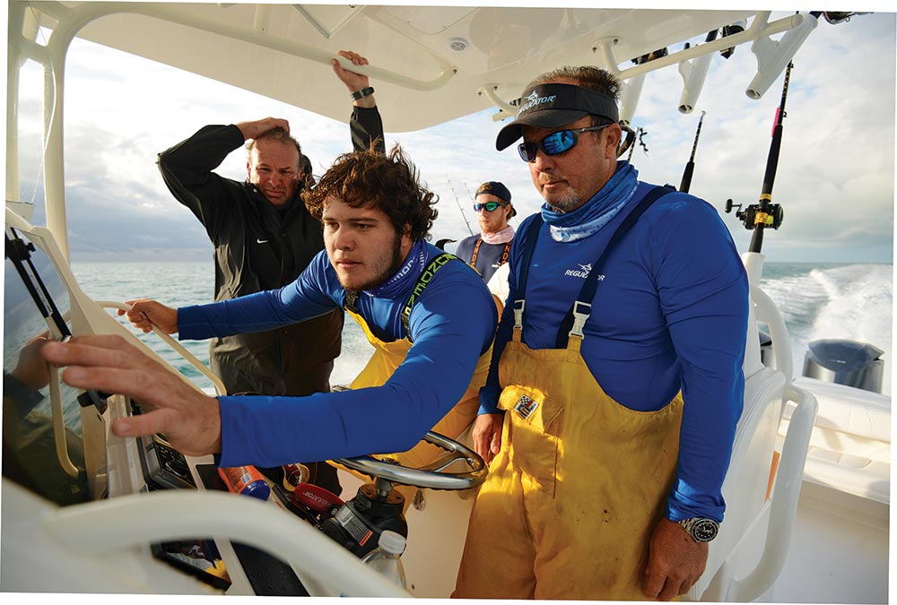 Anglers using marine electronics offshore fishing