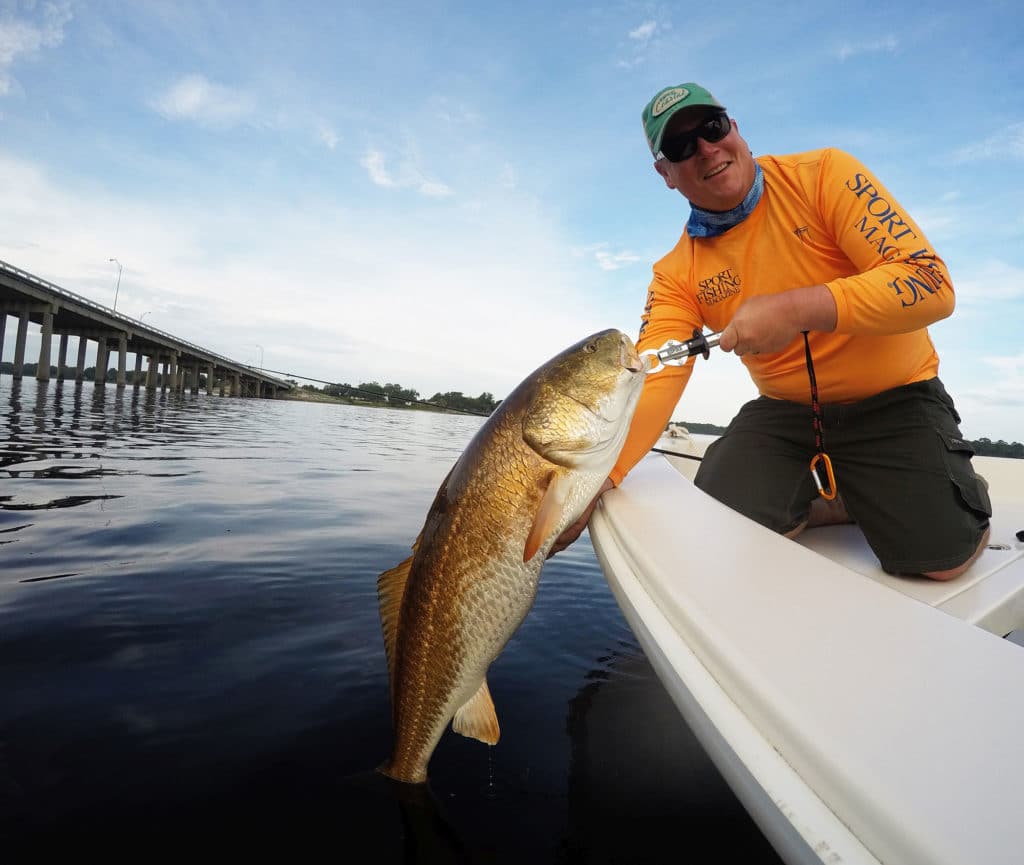 Fishing near bridge structure can offer good shots at bull reds.