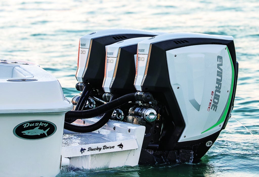 Dual Evinrude E-TEC G2 direct-injected two-strokes outboard engines on a fishing boat