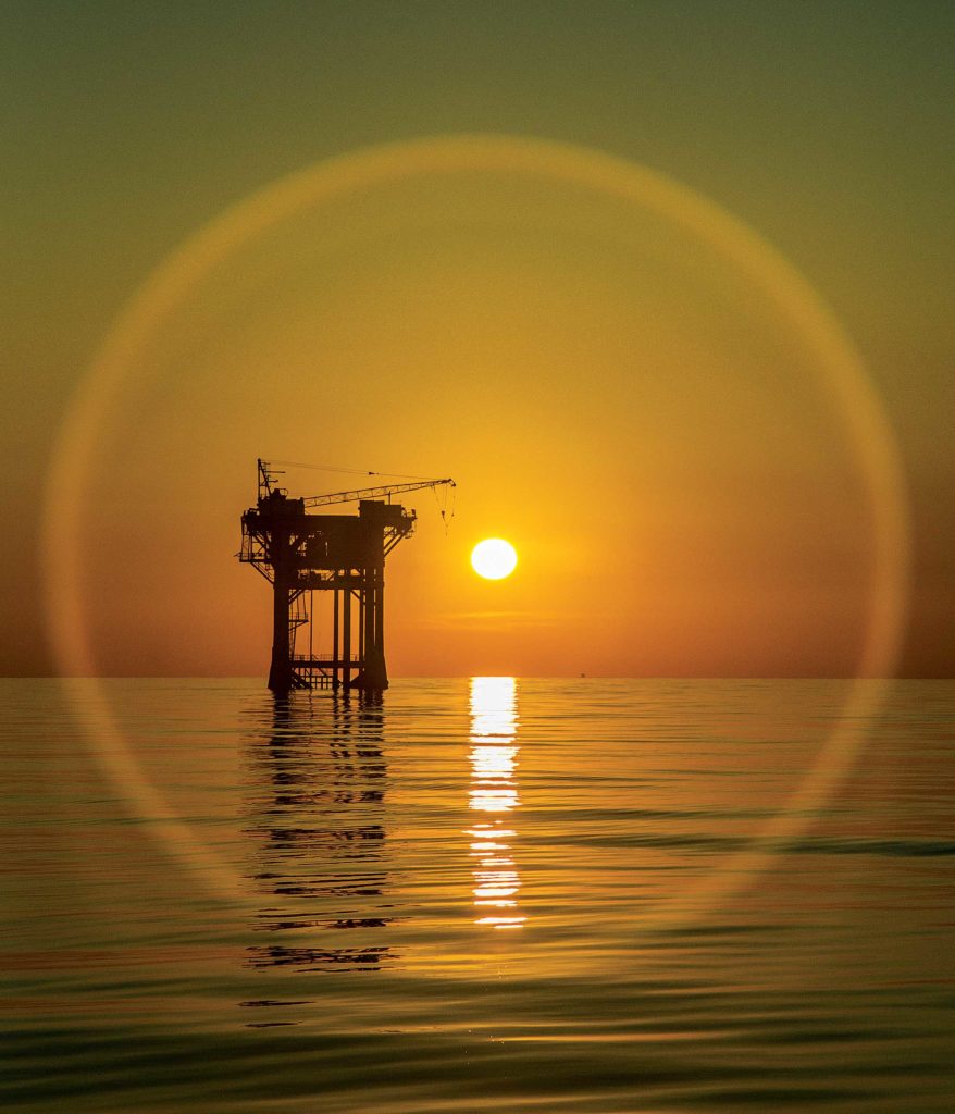 Sun shines on an offshore rig