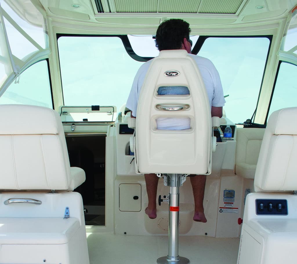 An expansive windshield on the Grady-White Express 330 offers a panoramic forward view.