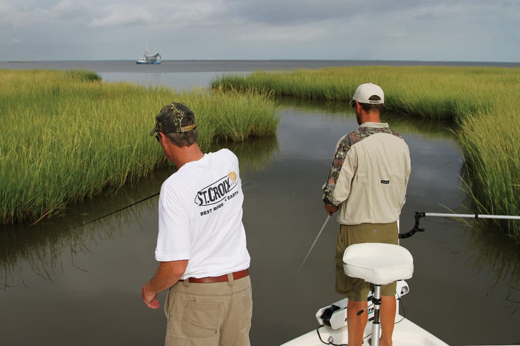 Anglers saltwater fishing brackish marshes inshore