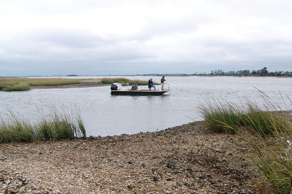 Anglers casting oyster bars with spinnerbait fishing lures