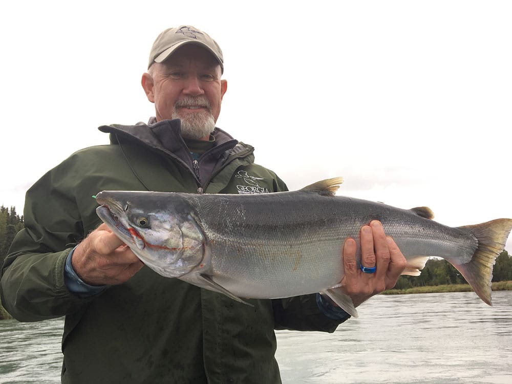 Tournament Angler with Silver Salmon