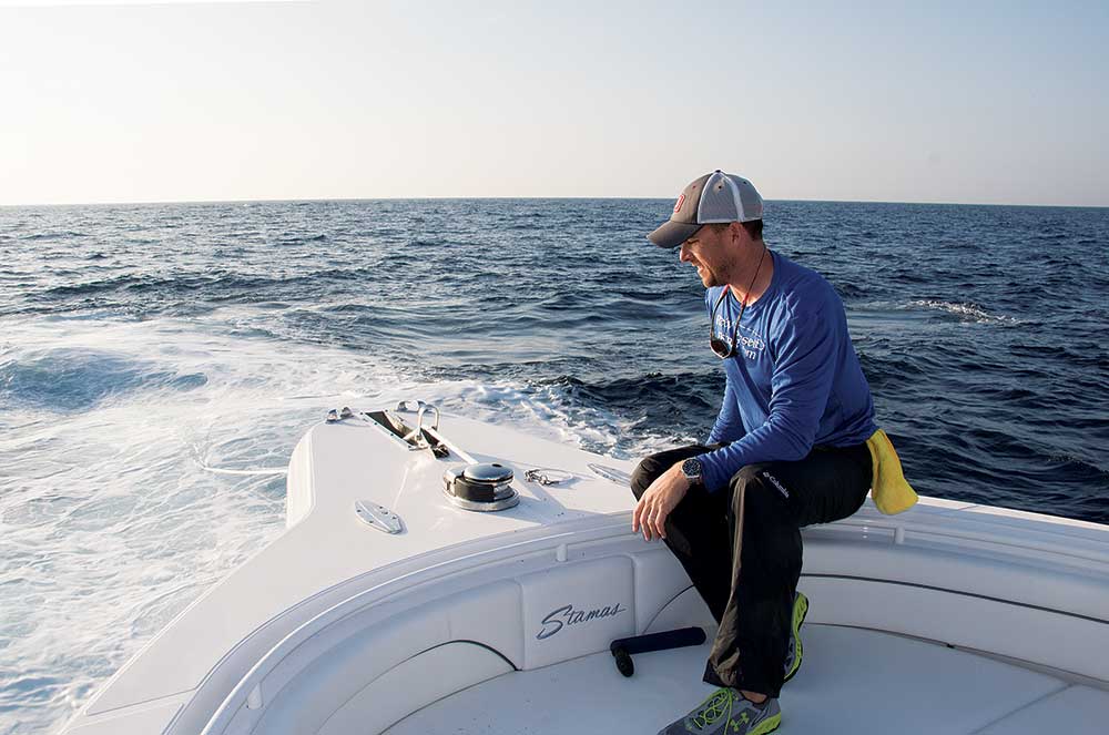 angler aboard Stamas 392 Tarpon center-console offshore saltwater fishing boat