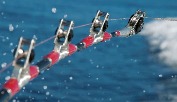 Trolling fishing rod roller guides