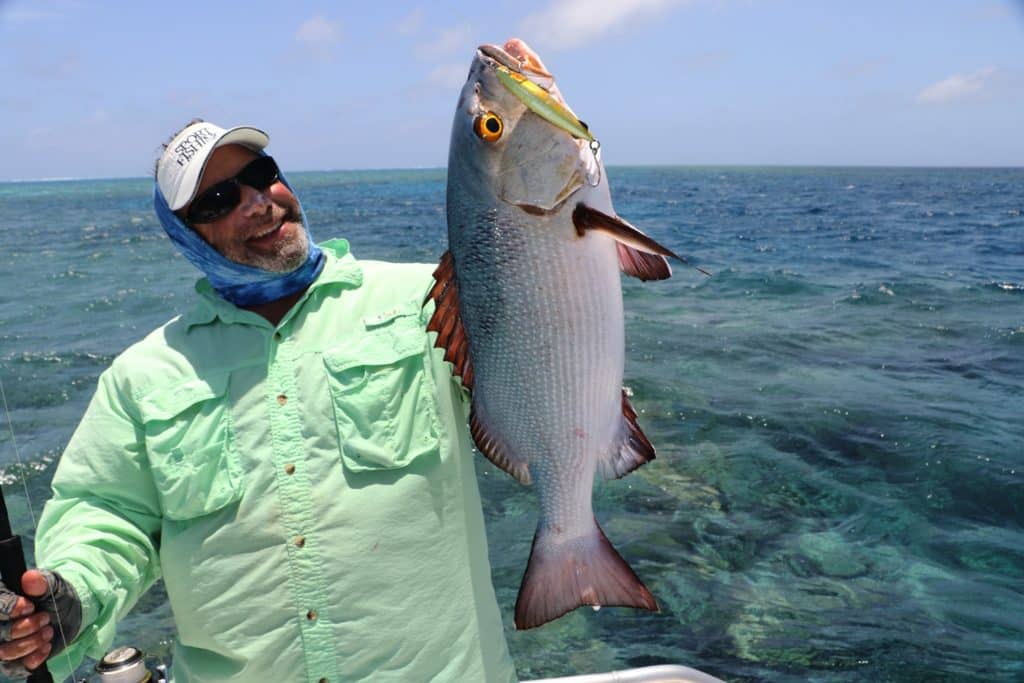 fishing Australia's Great Barrier Reef red bass saltwater game fish