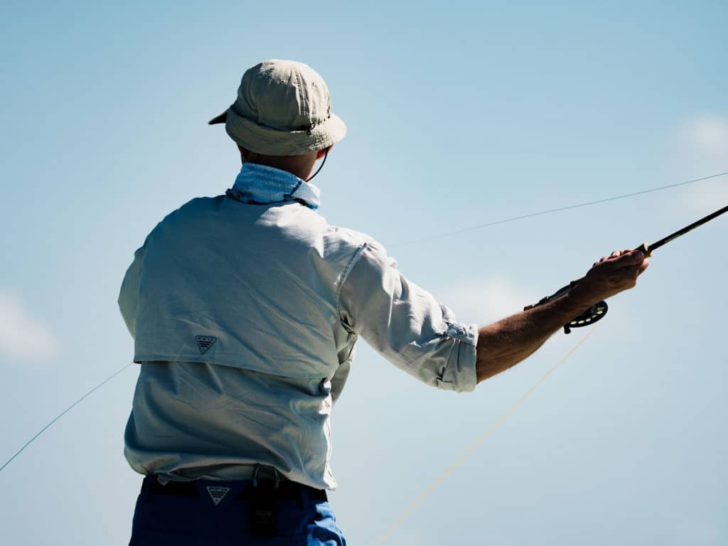 Angler fly fishing